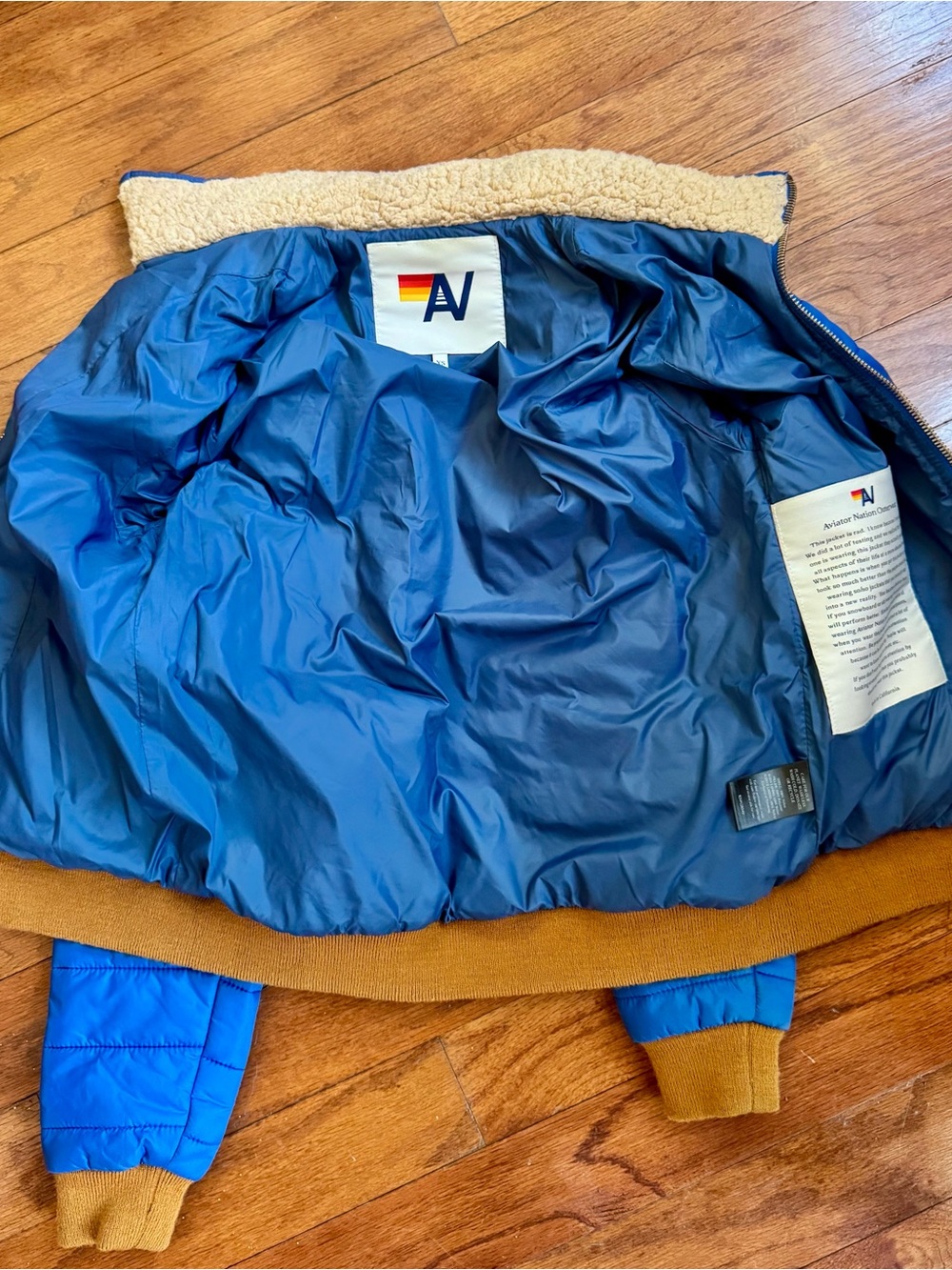 Aviator Nation Blue Puffer Jacket with Rainbow Sunburst - Picture 4 of 4